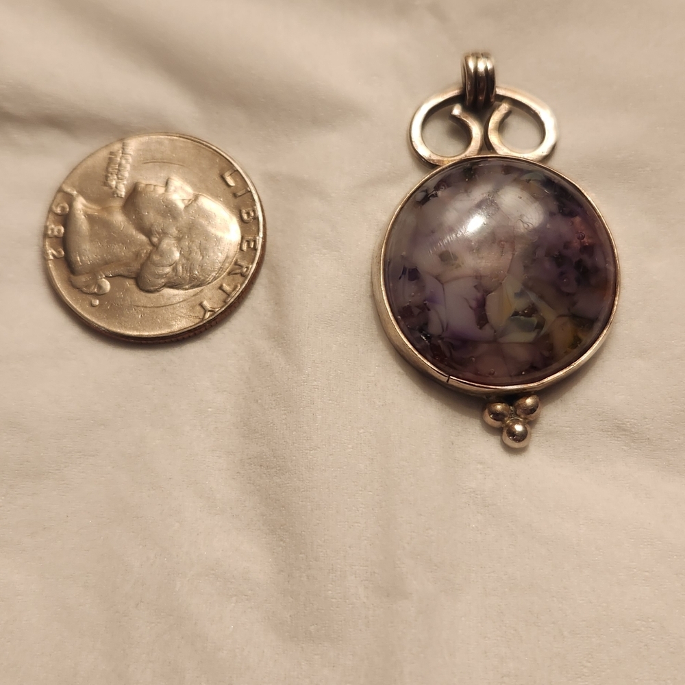 Sterling Silver Pendant.
